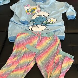 Blue Smurf sweater and rainbow mermaid pjs